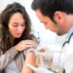 woman being vaccinated